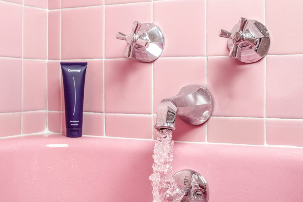 water coming out of bath faucet